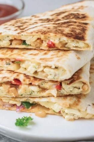Chicken cheese paratha stacked and sliced