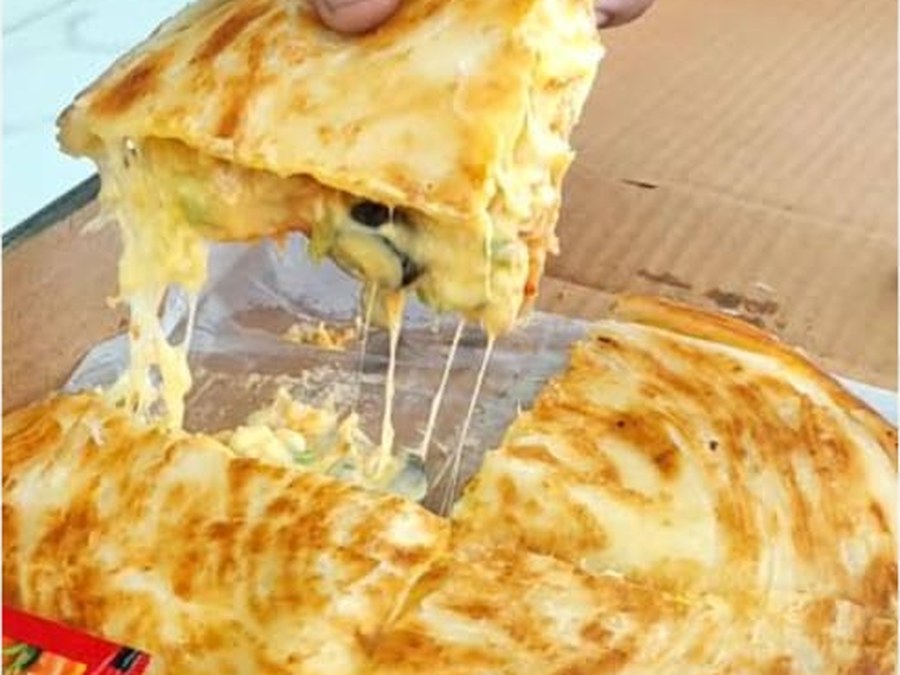 Special Pizza Paratha — Chicken, cheese and pizza masala over a crisp paratha base.